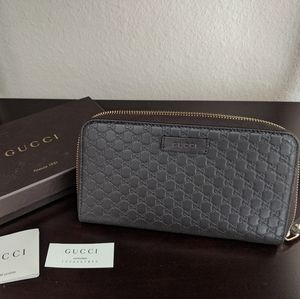 New Gucci Guccisima embossed leather wallet Brown